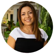 Diana Salazar, LCSW-QS, smiling in a professional setting, representing the clinical director role at Sunshine State Counseling Center.