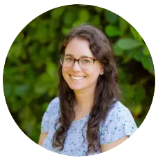 Elizabeth Covert, MSW, therapist at Sunshine State Counseling Center, smiling outdoors with a green background.